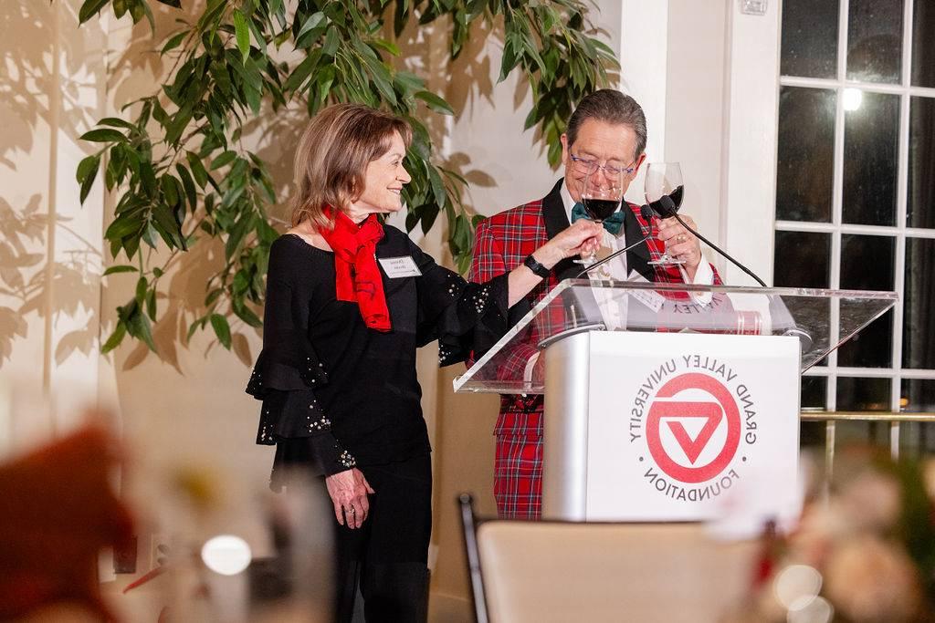 Jim and Donna Brooks giving toast at Annual Party